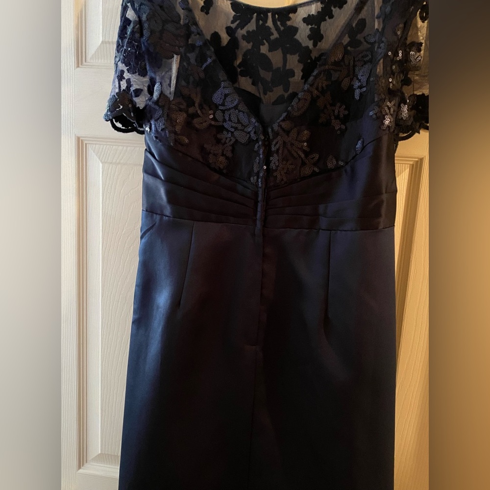 Beautiful navy dress with tags still on and never worn.